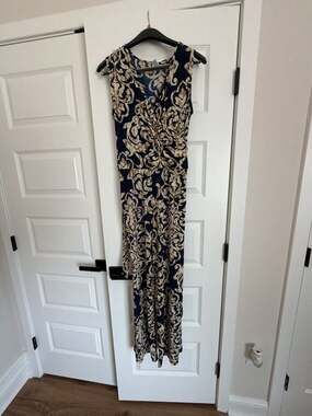 Touch Express sleeveless faux-wrap bodice wide-leg jumpsuit with navy and gold p